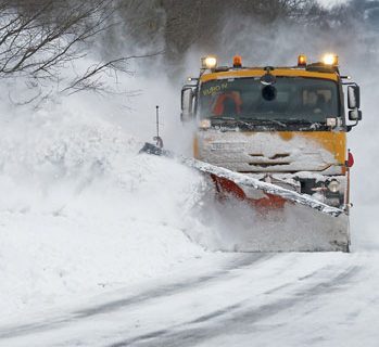 Truck Plowing Snow