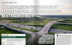 Aerial image of the Castle Pines Parkway and Interstate 25 interchange with a bright green landscape surrounding it.