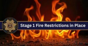 Fiery background with the Douglas County Sheriff's Office logo and text that reads Stage 1 Fire Restrictions in Place.
