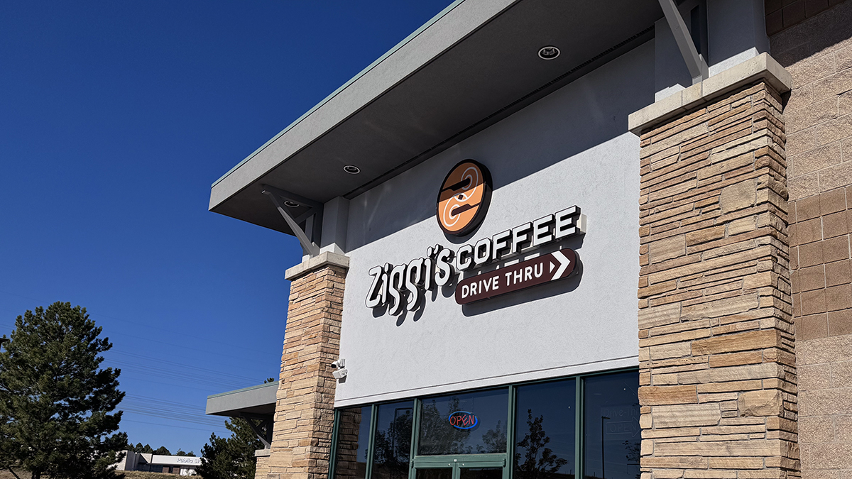 Ziggi's Coffee facade with a clear blue sky in the background.